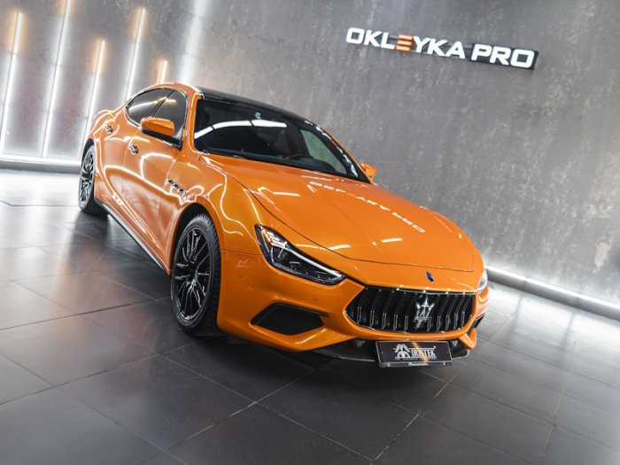 Maserati оклейка в оранжевый винил IRISTEK, антихром, шумоизоляция