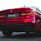 BMW 5 Series оклейка в красную виниловую пленку IRISTEK, антигравийная защита, детейлинг