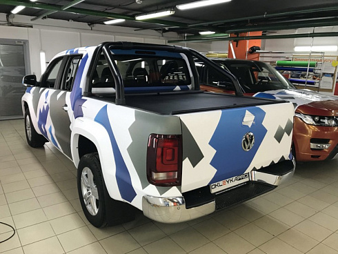 Volkswagen Amarok тюнинг камуфляжным автовинилом